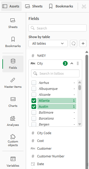 Assets with the city field expanded and the cities of Aarhus, Albuquerque, and Alicante selected