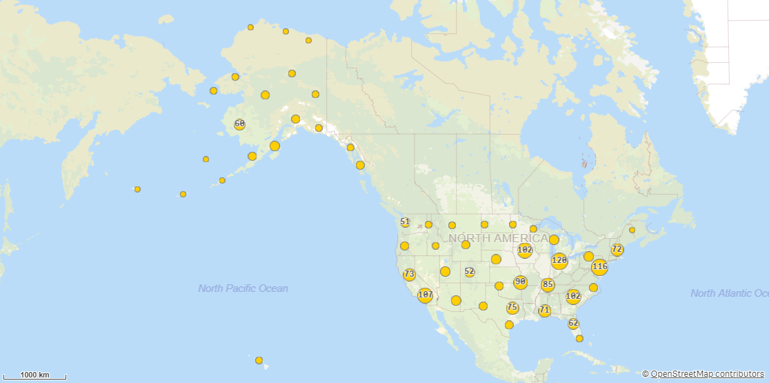 Un mapa que muestra varios puntos, con unos puntos agrupados condensados en un solo punto más grande que muestra el número total de puntos que contiene.